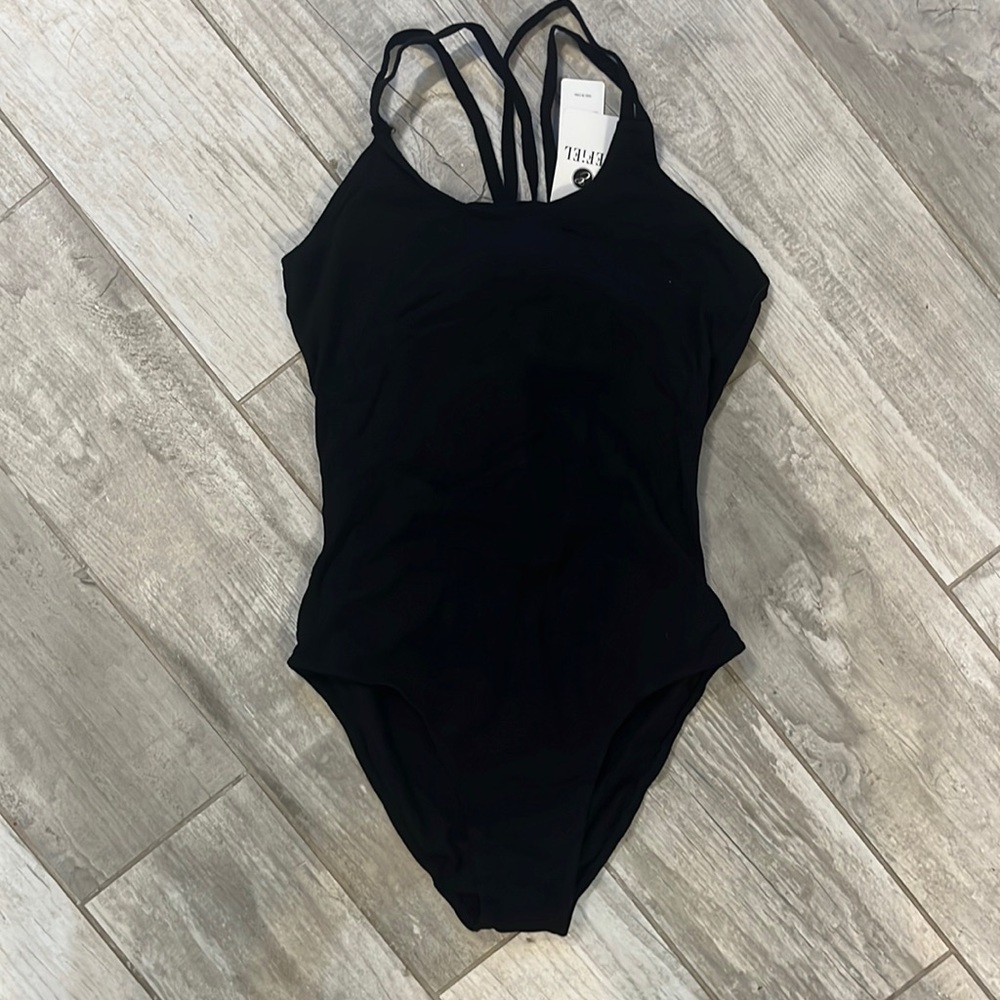 NWT leotard/bodysuit. Size extra small.